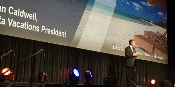 President of Delta Vacations, John Caldwell, welcomes travel agents to Atlanta.