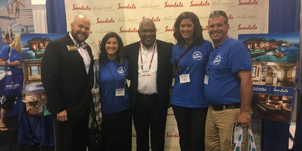 Rocking the KHM blue shirts with her sub-agent Ashley and sub-agent (& husband) Adam at Delta Vacations University.