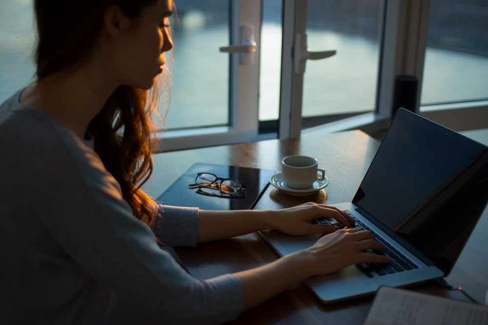 Woman Working From Home Evening