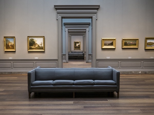 Symmetric View Of A Museum Room Looking Through Multiple Doors