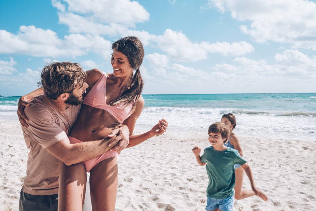 Family playing on Iberostar beach