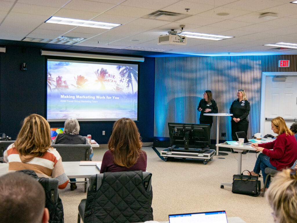 The Marketing Team leading the "Making Marketing Work for You" presentation in front of a group of agents