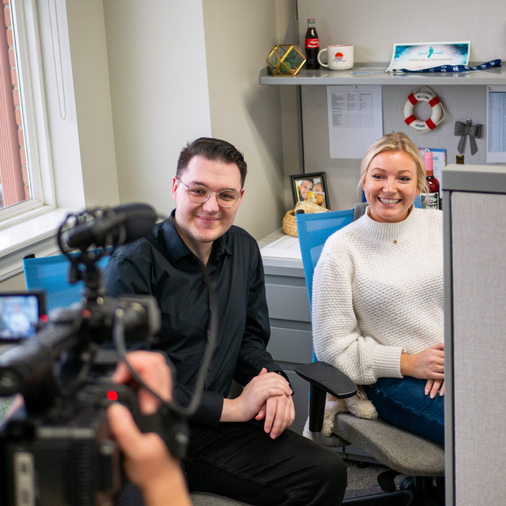 Engagement and events team members smiling at the camera